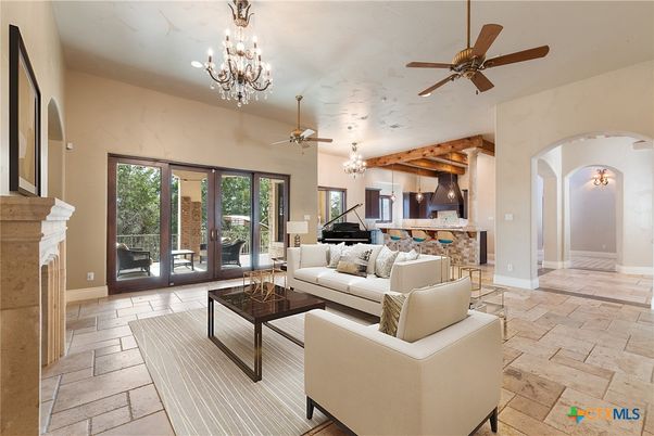 Chandelier, Fireplace, Interior, Living room, Piano, Recessed Lighting, Wooden Beams