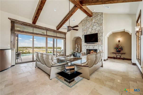 Fireplace, Interior, Living room, Recessed Lighting, Stone Walls, Wooden Beams