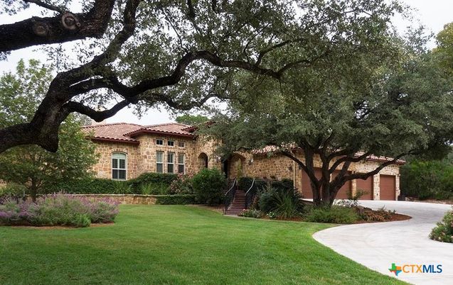 Attached, Backyard, Exterior, Facade, Brick Facade, Mediterranean