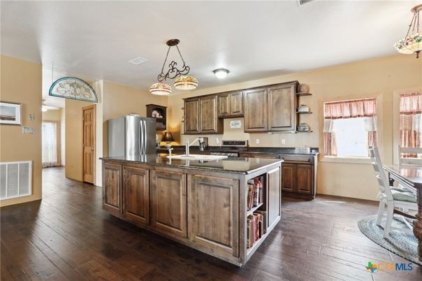 Chandelier, Interior, Kitchen, Pendant Lights, Stainless Steel Appliances, Wood Texture Flooring