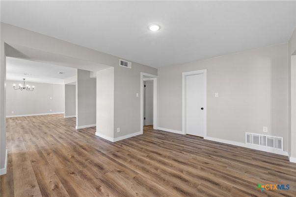 Chandelier, Empty room, Interior, Recessed Lighting, Wood Texture Flooring