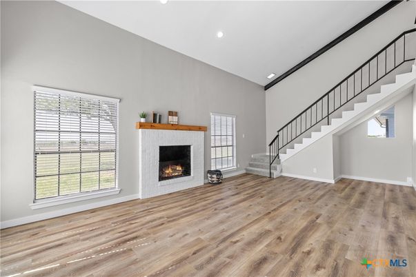 Empty room, Fireplace, Interior, Recessed Lighting, Wood Texture Flooring