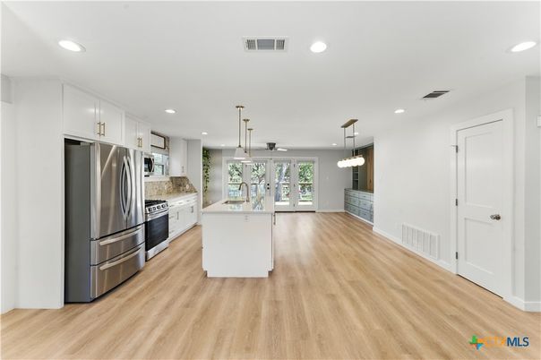 Interior, Kitchen, Pendant Lights, Recessed Lighting, Stainless Steel Appliances, Wood Texture Flooring
