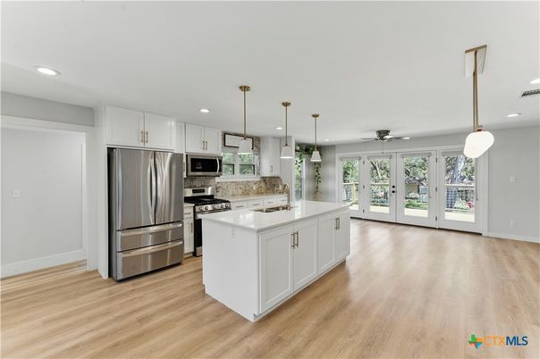 Interior, Kitchen, Pendant Lights, Recessed Lighting, Stainless Steel Appliances, Wood Texture Flooring