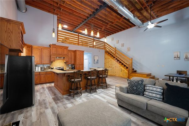 Interior, Kitchen, Living room, Pendant Lights, Stainless Steel Appliances, Wooden Beams, Wooden Ceilings, Wood Texture Flooring