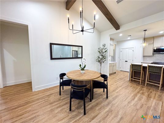 Chandelier, Dining room, Interior, Kitchen, Pendant Lights, Recessed Lighting, Wooden Beams, Wood Texture Flooring