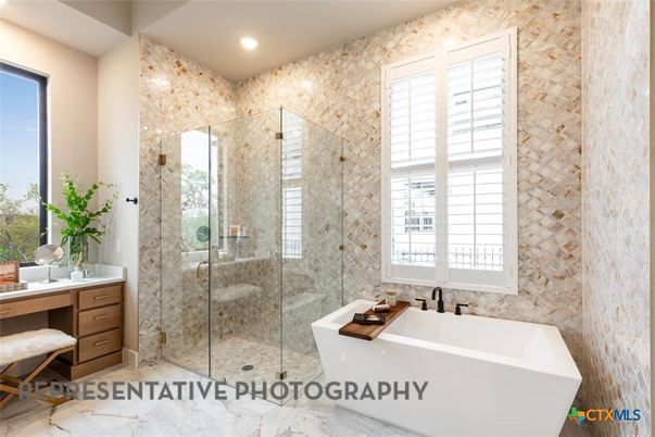Bathroom, Free Standing Baths, Glass Shower, Interior, Marble, Recessed Lighting, Stone Walls