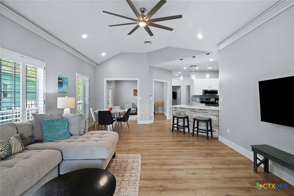 Dining room, Interior, Kitchen, Living room, Pendant Lights, Recessed Lighting, Stainless Steel Appliances, Wood Texture Flooring