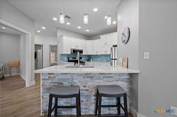 Interior, Kitchen, Pendant Lights, Recessed Lighting, Stainless Steel Appliances, Wood Texture Flooring