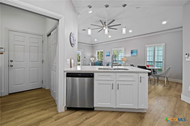 Dining room, Interior, Kitchen, Pendant Lights, Recessed Lighting, Stainless Steel Appliances, Wood Texture Flooring
