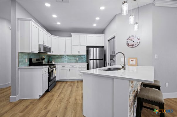 Interior, Kitchen, Pendant Lights, Recessed Lighting, Stainless Steel Appliances, Wood Texture Flooring