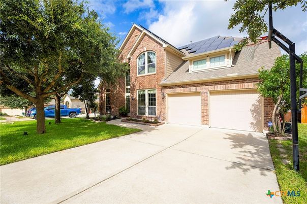 Attached, Exterior, Facade, Brick Facade, Solar Panels, Brick Traditional