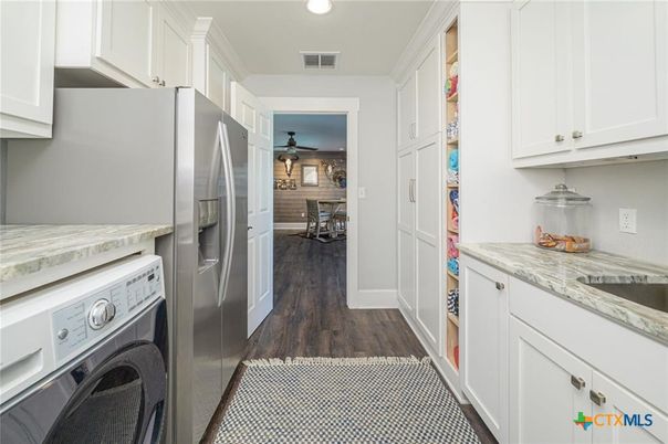 Dining room, Interior, Kitchen, Recessed Lighting, Washer, Wood Texture Flooring