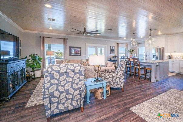 Dining room, Interior, Kitchen, Living room, Pendant Lights, Recessed Lighting, Stainless Steel Appliances, Wooden Ceilings, Wood Texture Flooring