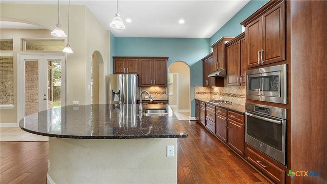 Interior, Kitchen, Pendant Lights, Recessed Lighting, Stainless Steel Appliances, Wood Texture Flooring