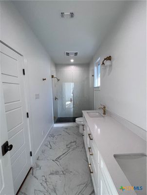 Bathroom, Dual Sink Vanities, Glass Shower, Interior, Marble, Recessed Lighting