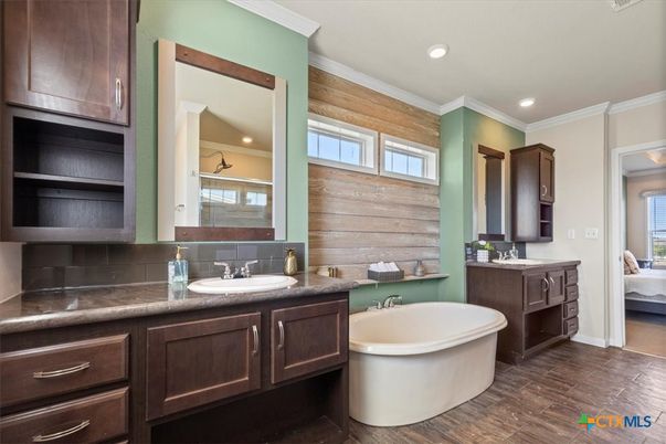 Bathroom, Dual Sink Vanities, Free Standing Baths, Interior, Recessed Lighting, Wood Texture Flooring, Wooden Walls