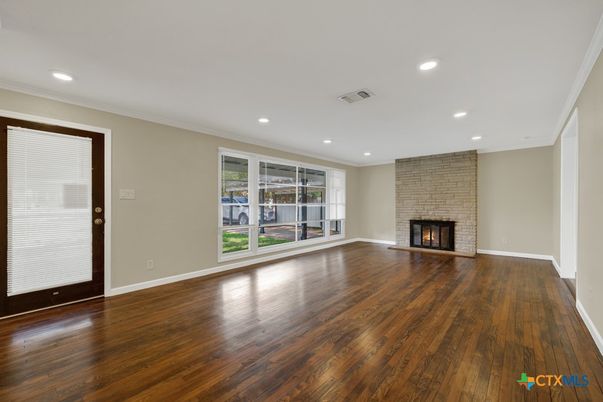 Empty room, Fireplace, Interior, Recessed Lighting, Wood Texture Flooring