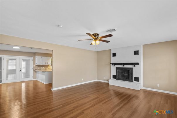 Empty room, Fireplace, Interior, Recessed Lighting, Wood Texture Flooring
