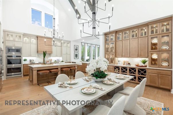 Chandelier, Dining room, Interior, Kitchen, Pendant Lights, Stainless Steel Appliances, Wood Texture Flooring