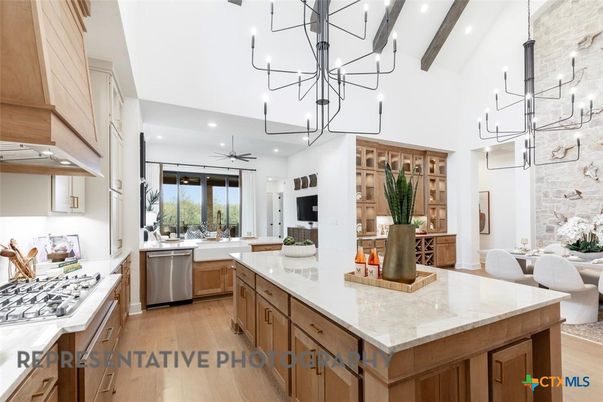 Chandelier, Dining room, Interior, Kitchen, Pendant Lights, Recessed Lighting, Stainless Steel Appliances, Wooden Beams, Wood Texture Flooring
