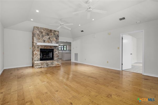 Empty room, Fireplace, Interior, Recessed Lighting, Wood Texture Flooring
