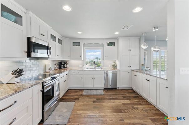 Interior, Kitchen, Pendant Lights, Recessed Lighting, Stainless Steel Appliances, Wood Texture Flooring