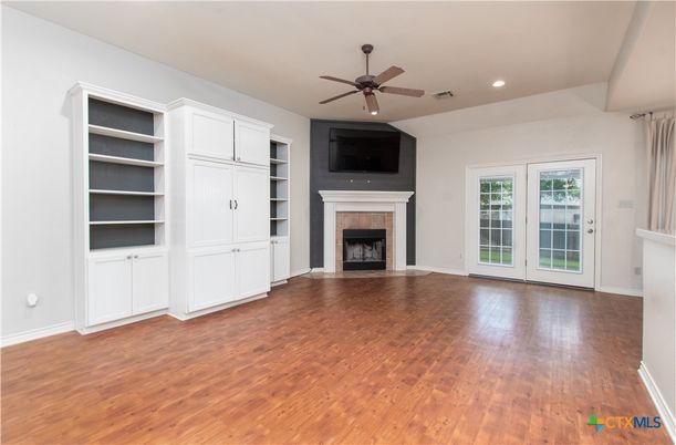 Empty room, Fireplace, Interior, Recessed Lighting, Wood Texture Flooring