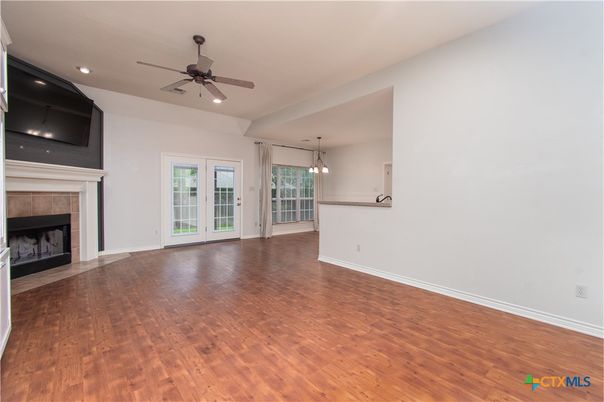 Empty room, Fireplace, Interior, Pendant Lights, Recessed Lighting, Wood Texture Flooring