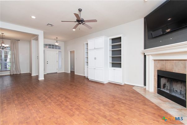 Empty room, Fireplace, Interior, Pendant Lights, Recessed Lighting, Wood Texture Flooring