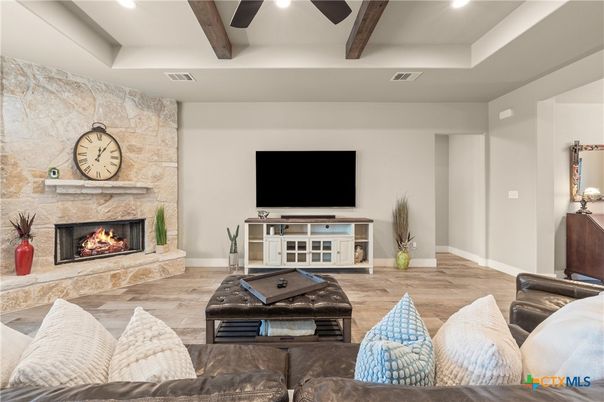 Fireplace, Interior, Living room, Recessed Lighting, Stone Walls, Wooden Beams, Wood Texture Flooring