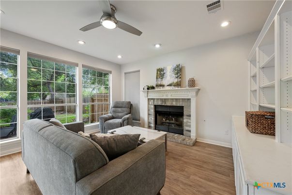 Fireplace, Interior, Living room, Recessed Lighting, Wood Texture Flooring