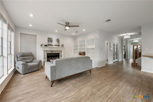 Fireplace, Interior, Living room, Recessed Lighting, Wood Texture Flooring