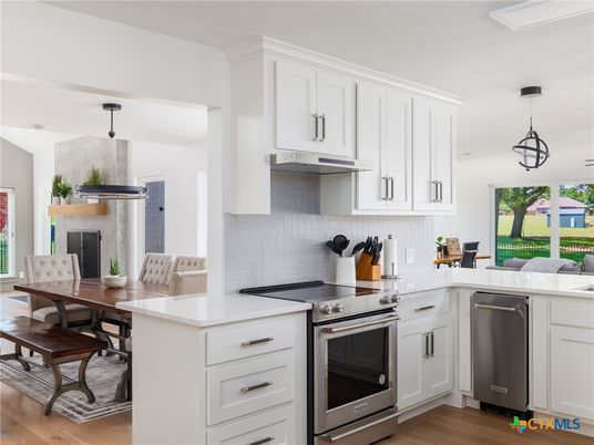 Dining room, Interior, Kitchen, Pendant Lights, Stainless Steel Appliances, Wood Texture Flooring
