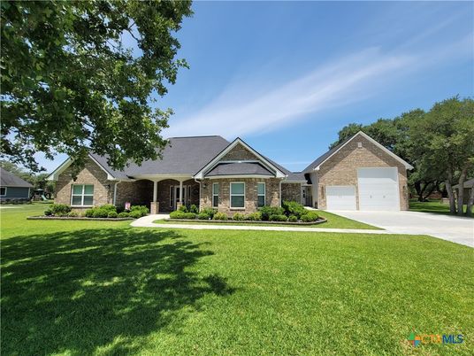 Attached, Backyard, Exterior, Facade, Brick Facade, Ranch