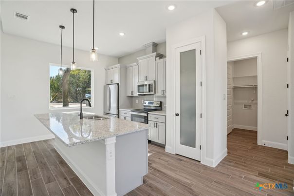 Interior, Kitchen, Pendant Lights, Recessed Lighting, Stainless Steel Appliances, Wood Texture Flooring