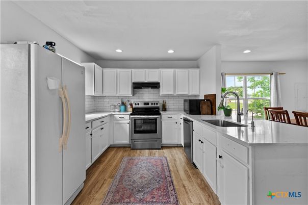 Interior, Kitchen, Recessed Lighting, Stainless Steel Appliances, Wood Texture Flooring