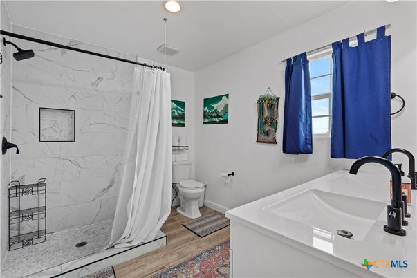 Bathroom, Interior, Marble Walls, Recessed Lighting, Wood Texture Flooring