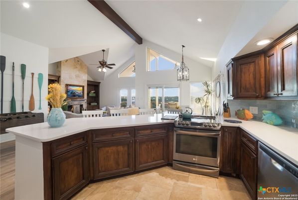 Dining room, Fireplace, Interior, Kitchen, Pendant Lights, Recessed Lighting, Stainless Steel Appliances, Wooden Beams