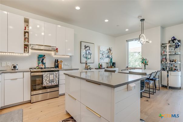 Interior, Kitchen, Pendant Lights, Recessed Lighting, Stainless Steel Appliances, Wood Texture Flooring