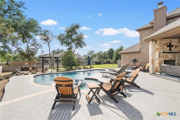 Exterior, Fireplace, Pool