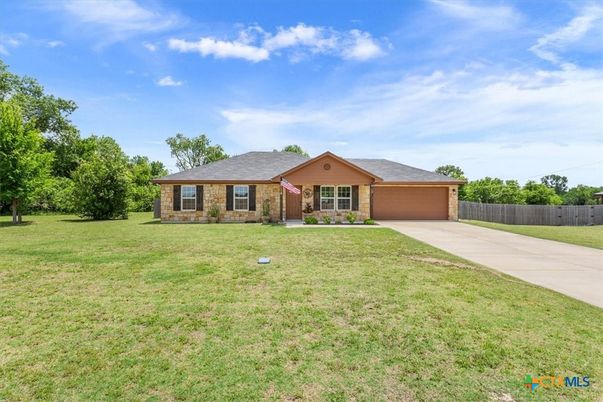 Attached, Backyard, Exterior, Facade, Brick Facade, Ranch