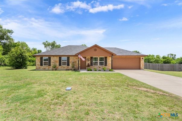 Attached, Backyard, Exterior, Facade, Brick Facade, Ranch