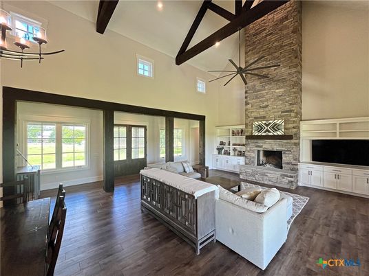 Fireplace, Interior, Living room, Recessed Lighting, Stone Walls, Wooden Beams, Wood Texture Flooring