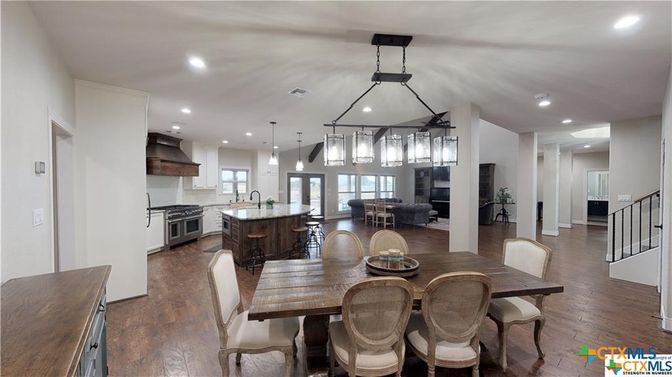 Dining room, Interior, Kitchen, Pendant Lights, Recessed Lighting, Stainless Steel Appliances, Wood Texture Flooring