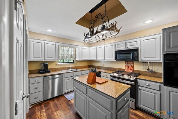 Chandelier, Interior, Kitchen, Recessed Lighting, Stainless Steel Appliances, Wood Texture Flooring