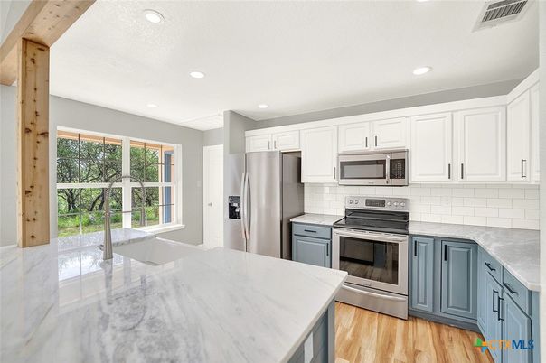 Interior, Kitchen, Recessed Lighting, Stainless Steel Appliances, Wood Texture Flooring