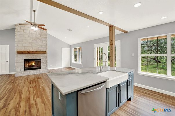 Fireplace, Interior, Kitchen, Recessed Lighting, Stone Walls, Wooden Beams, Wood Texture Flooring