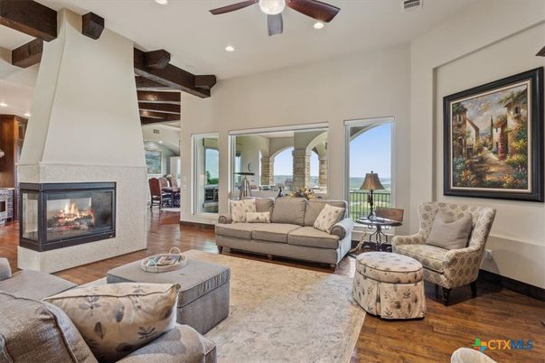 Fireplace, Interior, Living room, Recessed Lighting, Water, Wooden Beams, Wood Texture Flooring