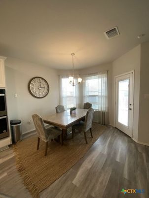 Chandelier, Dining room, Interior, Wood Texture Flooring